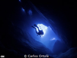 Neptune's cave exit. Portichol Island. Javea. by Carlos Ortolà 